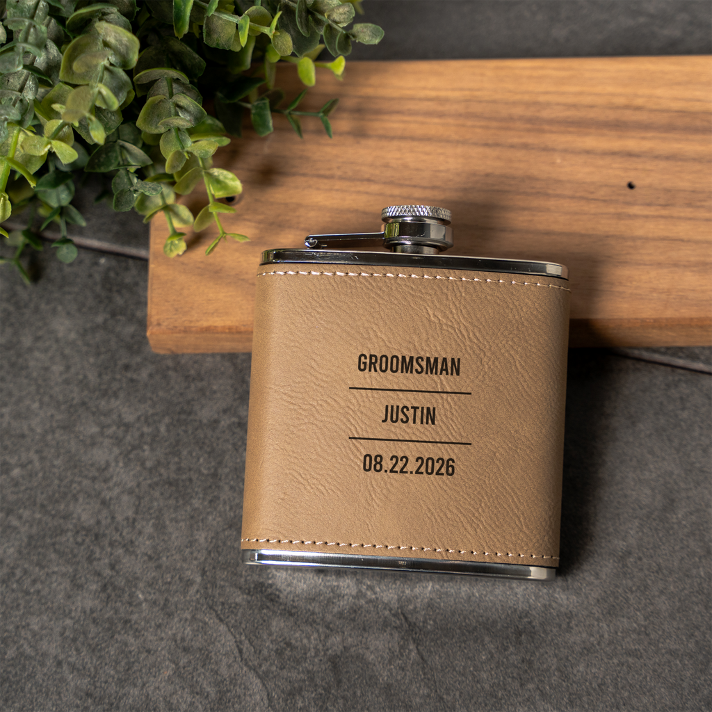 Engraved leather flask, part of The Signature set